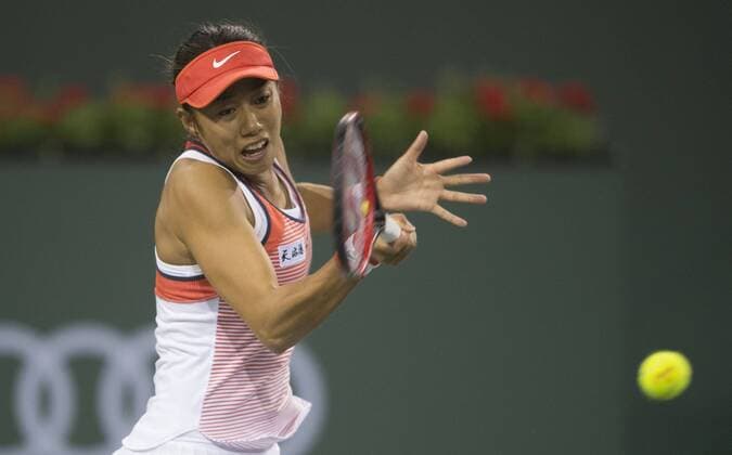 Zhang Shuai of China returns the ball during the women s singles 3rd round match against Victoria Azarenka of Belarus at the BNP Paribas Open in Indian Wells, California, the United States on March 14, 2016.Yang Lei) (SP)US-INDIAN WELLS-TENNIS-BNP PARIBAS OPEN YangxLeixc 
