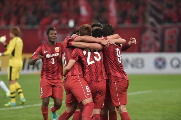 SHANGHAI, CHINA - MARCH 15: (CHINA OUT) Elkeson 9 of Shanghai SIPG celebrates with team mates after scoring his team s first goal during the AFC Champions League Group G match between Shanghai SIPG and Gamba Osaka at Shanghai Stadium on March 15, 2016 in Shanghai, China.  CFP481171271 