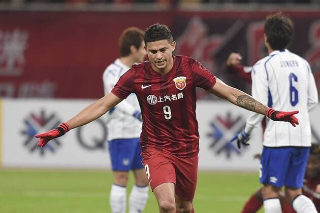 SHANGHAI, CHINA - MARCH 15: (CHINA OUT) Elkeson 9 of Shanghai SIPG celebrates after scoring his team s first goal during the AFC Champions League Group G match between Shanghai SIPG and Gamba Osaka at Shanghai Stadium on March 15, 2016 in Shanghai, China.  CFP481171923 