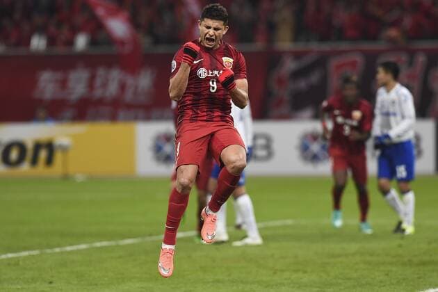 SHANGHAI, CHINA - MARCH 15: (CHINA OUT) Elkeson 9 of Shanghai SIPG celebrates after scoring his team s first goal during the AFC Champions League Group G match between Shanghai SIPG and Gamba Osaka at Shanghai Stadium on March 15, 2016 in Shanghai, China.  CFP481171922 