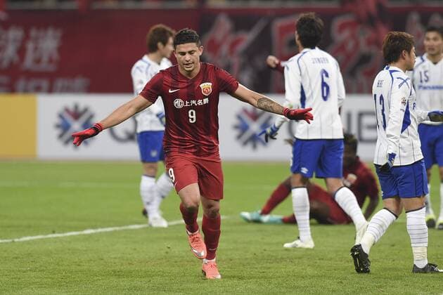 SHANGHAI, CHINA - MARCH 15: (CHINA OUT) Elkeson 9 of Shanghai SIPG celebrates after scoring his team s first goal during the AFC Champions League Group G match between Shanghai SIPG and Gamba Osaka at Shanghai Stadium on March 15, 2016 in Shanghai, China.  CFP481171924 