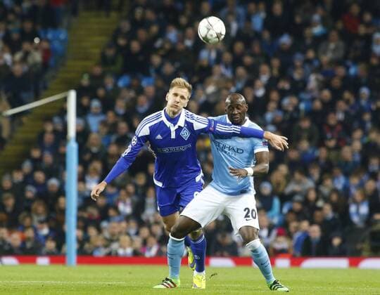 15.03.2016. Etihad Stadium, Manchester, England. Champions League. Manchester City versus Dynamo Kiev. Dynamo Kiev defender Mykola Morozyuk wins an aerial challenge against Manchester City defender Eliaquim Mangala. xAlanxMartinx  ActionPlus11718409
