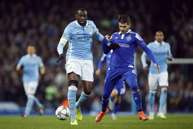 Yaya Toure of Manchester City battles Kiev s Miguel Veloso during the UEFA Champions League match at the Etihad Stadium. Photo credit should read: Philip Oldham Sportimage EDITORIAL USE ONLY. No use with unauthorised audio, video, data, fixture lists, club league logos or live services. Online in-match use limited to 120 images, no video emulation. No use in betting, games or single club league player publications.