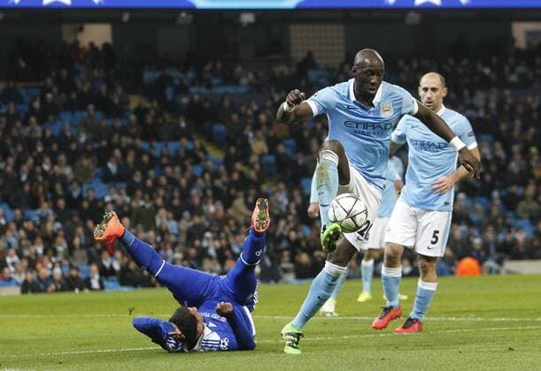 15.03.2016. Etihad Stadium, Manchester, England. Champions League. Manchester City versus Dynamo Kiev. Manchester City defender Eliaquim Mangala dispossesses Dynamo Kiev midfielder Olexandr Yakovenko in the City pebalty area and leaves him spawling. xAlanxMartinx  ActionPlus11718461