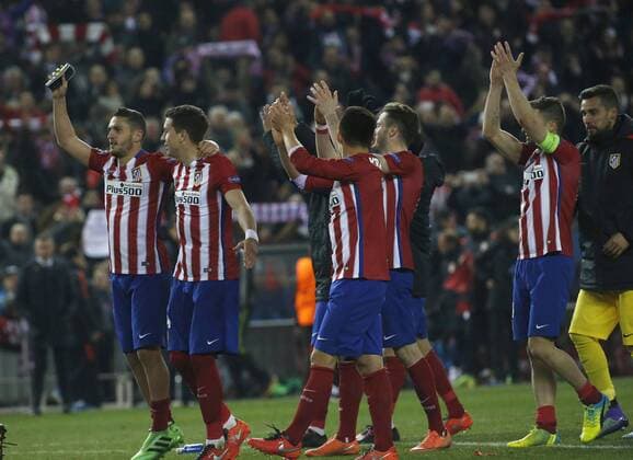 Atletico de Madrid players celebrate the victory over PSV Eindhoven during a Champions League round 16 second leg match held at Vicente Calderon stadium in Madrid, Spain, 15 March 2016. ATLETICO MADRID VS PSV ENINDHOVEN !ACHTUNG: NUR REDAKTIONELLE NUTZUNG!  MAD034 20160315-635936829869091386