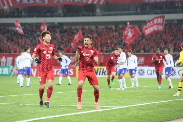 Elkeson de Oliveira Cardoso of China s Shanghai SIPG, center, celebrates after scoring a goal against Japan s Gamba Osaka during their Group G third round match of the AFC Champions League 2016 in Shanghai, China, 15 March 2016. Brazilian forward Elkeson s double strike fired Shanghai SIPG to the top of their AFC Champions League group with a 2-1 win over Gamba Osaka on Tuesday (15 March 2016). Elkeson, off-loaded by reigning Asian champions Guangzhou Evergrande in January, looked an increasingly important signing as he sealed SIPG s second win in Group G. It was enough for Sven-Goran Eriksson s side to leapfrog Melbourne Victory, who were held 0-0 by South Korea¡¯s Suwon Samsung Bluewings in a combative contest earlier. Elkeson put SIPG ahead with a finish from close range on 41 minutes as the home side dominated. And after his Brazilian opposite number Patric nodded Gamba level on the hour-mark, Elkeson popped up again with the match-winning strike just two minutes later. The decisive goal may have made uncomfortable viewing for Evergrande fans as it came from a cross by Dario Conca, Elkeson s former team-mate at the Asian and Chinese title-holders. Meanwhile big-spending Chinese team Jiangsu Suning s unconvincing campaign remained stuck in second gear with a 0-0 draw away to FC Tokyo. Elkeson double fires Shanghai top of AFC Champions League group  20160315_11514