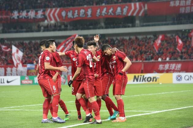 Players of China s Shanghai SIPG celebrate after scoring a goal against Japan s Gamba Osaka during their Group G third round match of the AFC Champions League 2016 in Shanghai, China, 15 March 2016. Brazilian forward Elkeson s double strike fired Shanghai SIPG to the top of their AFC Champions League group with a 2-1 win over Gamba Osaka on Tuesday (15 March 2016). Elkeson, off-loaded by reigning Asian champions Guangzhou Evergrande in January, looked an increasingly important signing as he sealed SIPG s second win in Group G. It was enough for Sven-Goran Eriksson s side to leapfrog Melbourne Victory, who were held 0-0 by South Korea¡¯s Suwon Samsung Bluewings in a combative contest earlier. Elkeson put SIPG ahead with a finish from close range on 41 minutes as the home side dominated. And after his Brazilian opposite number Patric nodded Gamba level on the hour-mark, Elkeson popped up again with the match-winning strike just two minutes later. The decisive goal may have made uncomfortable viewing for Evergrande fans as it came from a cross by Dario Conca, Elkeson s former team-mate at the Asian and Chinese title-holders. Meanwhile big-spending Chinese team Jiangsu Suning s unconvincing campaign remained stuck in second gear with a 0-0 draw away to FC Tokyo. Elkeson double fires Shanghai top of AFC Champions League group  20160315_11562