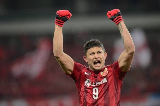 Elkeson de Oliveira Cardoso of China s Shanghai SIPG celebrates after scoring a goal against Japan s Gamba Osaka during their Group G third round match of the AFC Champions League 2016 in Shanghai, China, 15 March 2016. Brazilian forward Elkeson s double strike fired Shanghai SIPG to the top of their AFC Champions League group with a 2-1 win over Gamba Osaka on Tuesday (15 March 2016). Elkeson, off-loaded by reigning Asian champions Guangzhou Evergrande in January, looked an increasingly important signing as he sealed SIPG s second win in Group G. It was enough for Sven-Goran Eriksson s side to leapfrog Melbourne Victory, who were held 0-0 by South Korea¡¯s Suwon Samsung Bluewings in a combative contest earlier. Elkeson put SIPG ahead with a finish from close range on 41 minutes as the home side dominated. And after his Brazilian opposite number Patric nodded Gamba level on the hour-mark, Elkeson popped up again with the match-winning strike just two minutes later. The decisive goal may have made uncomfortable viewing for Evergrande fans as it came from a cross by Dario Conca, Elkeson s former team-mate at the Asian and Chinese title-holders. Meanwhile big-spending Chinese team Jiangsu Suning s unconvincing campaign remained stuck in second gear with a 0-0 draw away to FC Tokyo. Elkeson double fires Shanghai top of AFC Champions League group  20160315_50715