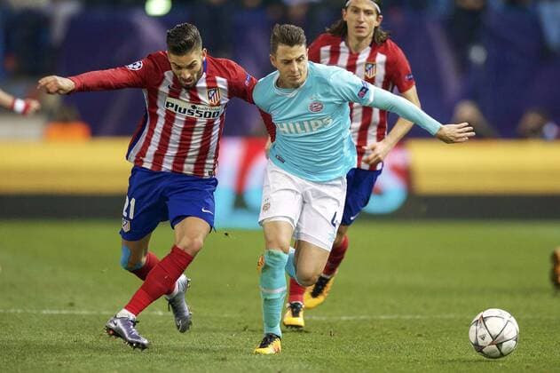 (L-R) Yannick Carrasco of Club Atletico de Madrid, Santiago Arias of PSV, Filipe Luis of Club Atletico de Madrid during the UEFA Champions League Round of 16, Second leg match between Atletico madrid and PSV Eindhoven on March 15, 2016 at the Estadio Vicente Calder& 243;n in Madrid, Spain. Atletico Madrid v PSV Eindhoven UEFA Champions League 2015 2016 xVIxxIVx 5165470