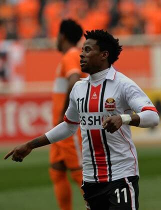 (160316) -- JINAN, March 16, 2016 -- Carlos Adriano of South Korea s FC Seoul celebrates scoring during their Group F third round match against China s Shandong Luneng at the 2016 AFC Championships League in Jinan, capital of north China s Shandong Province, March 16, 2016. FC Seoul won 4-1. ) (SP)CHINA-JINAN-AFC CHAMPIONSHIPS LEAGUE 2016-GROUP F-SHANDONG LUNENG VS FC SEOUL ZhuxZheng 