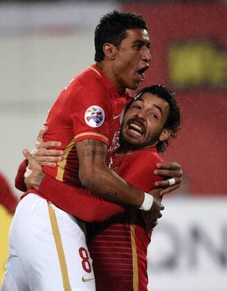 (160316) -- GUANGZHOU, March 16, 2016 -- Ricardo Goulart (R) of Guangzhou Evergrande celebrates after scoring with his teammate during the Group H third round match between China s Guangzhou Evergrande and Japan s Urawa Red Diamonds in Guangzhou, capital of south China s Guangdong Province, March 16, 2016. ) (SP)CHINA-GUANGZHOU-SOCCER-AFC CHAMPIONSHIPS LEAGUE 2016-GROUP H-GUANGZHOU EVERGRANDE VS URAWA RED DIAMONDS (CN) LiuxDawei 