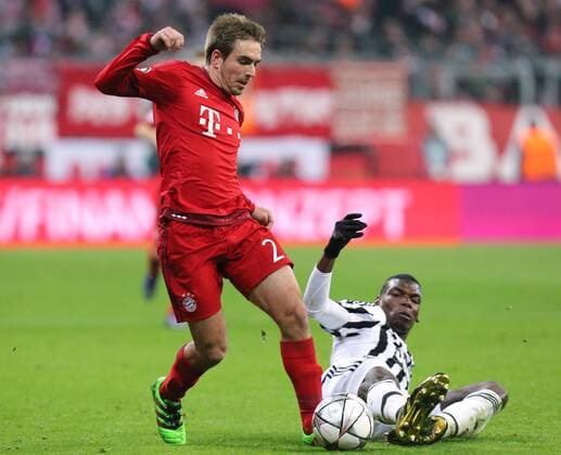 München Fußball Champions League Bayern München vs. Juventus Turin, v.l. Philipp Lahm (Bayern), Paul Pogba (Turin)