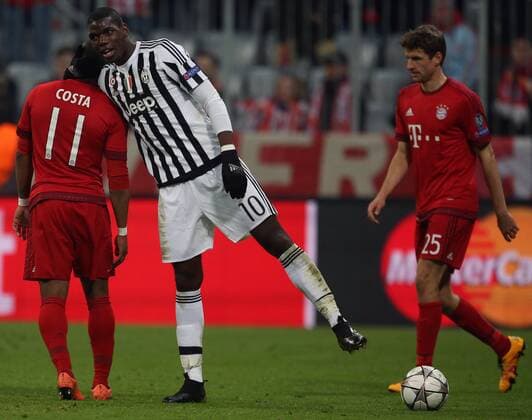SOCCER - CL, Bayern vs Juventus MUNICH,GERMANY,16.MAR.16 - SOCCER - UEFA Champions League, Round of 16, FC Bayern Muenchen vs Juventus Turin. Image shows Douglas Costa (Bayern), Paul Pogba (Juventus) and Thomas Mueller (Bayern). GEPAxpictures xThomasxBachun