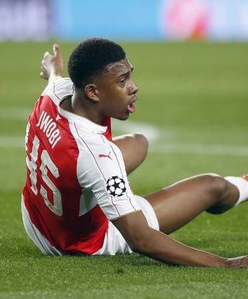 Arsenal FC forward Alex Iwobi complains after suffering a possible penalty during a Champions League round 16 match held at Camp Nou stadium in Barcelona, Catalonia, Spain, 16 March 2016. BARCELONA VS ARSENAL !ACHTUNG: NUR REDAKTIONELLE NUTZUNG!  BAR008 20160316-635937618669092200