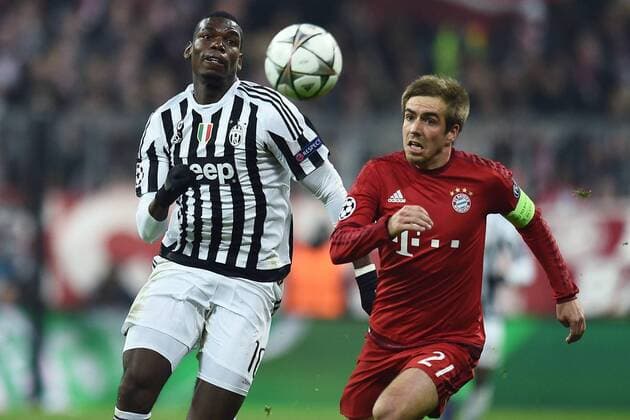 München, Deutschland - Fussball, Champions League, FC Bayern München vs. Juventus Turin: Paul Pogba-Philip Lahm 