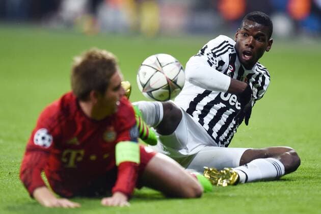 München, Deutschland - Fussball, Champions League, FC Bayern München vs. Juventus Turin: Paul Pogba-Philip Lahm 