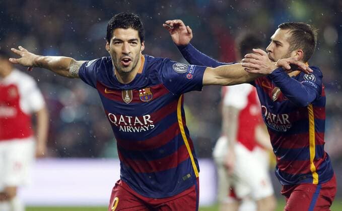 FC Barcelona Barca Uruguayan forward Luis Suarez celebrates a goal before Arsenal FC with team mate Jordi Alba (R) during a Champions League round 16 match held at Camp Nou stadium in Barcelona, Catalonia, Spain, 16 March 2016. BARCELONA VS ARSENAL !ACHTUNG: NUR REDAKTIONELLE NUTZUNG!  BAR021 20160316-635937646992290982