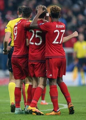 SOCCER - CL, Bayern vs Juventus MUNICH,GERMANY,16.MAR.16 - SOCCER - UEFA Champions League, Round of 16, FC Bayern Muenchen vs Juventus Turin. Image shows the rejoicing of Robert Lewandowski, Thomas Mueller and David Alaba (Bayern). GEPAxpictures xThomasxBachun