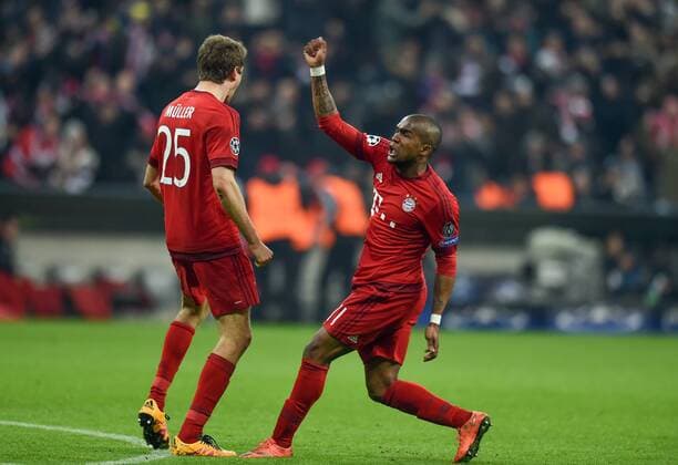 FUSSBALL CHAMPIONS LEAGUE SAISON 2015 2016 ACHTELFINALE RUECKSPIEL FC Bayern Muenchen - Juventus Turin 16.03.2016 Thomas Mueller (li) und Douglas Costa (re, beide FC Bayern Muenchen) jubeln nach dem Tor zum 2:2 
