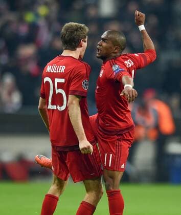 FUSSBALL CHAMPIONS LEAGUE SAISON 2015 2016 ACHTELFINALE RUECKSPIEL FC Bayern Muenchen - Juventus Turin 16.03.2016 Thomas Mueller (li) und Douglas Costa (re, beide FC Bayern Muenchen) jubeln nach dem Tor zum 2:2 