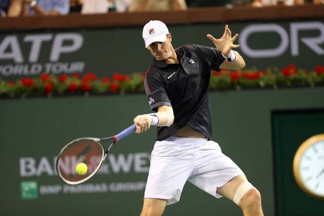 March 16, 2016: John Isner returns a shot against Kei Nishikori of Japan during the 2016 BNP Paribas Open at Indian Wells Tennis Garden in Indian Wells, California. TENNIS 2016: BNP Paribas Open MAR 16 - ZUMAcb8_