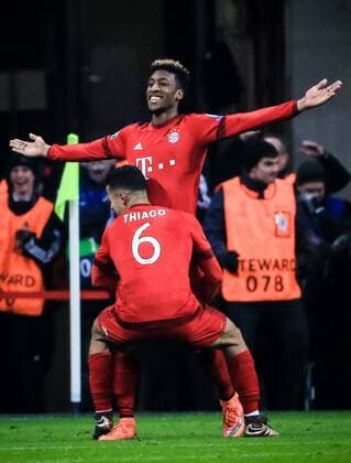 (160317) -- MUNICH, March 16, 2016 -- Bayern Munich s French defender Kingsley Coman (Top) celebrates after scoring with teammate Thiago Alcantara during the round of 16 second leg match of UEFA Champions League between Bayern Munich and Juventus in Munich, Germany, on March 16, 2016. Bayern Munich won the match by 4-2 and advanced to the quarterfinal with a 6-4 aggregate victory. ) (SP)GERMANY-MUNICH-UEFA CHAMPIONS LEAGUE-ROUND OF 16 SECOND LEG-BAYERN MUNICH VS JUVENTUS PhilippexRuiz 