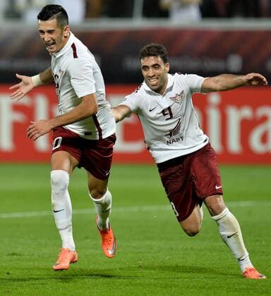 (160317) -- DOHA, March 16, 2016 -- Sardor Rashidov (L) of Qatar s El Jaish celebrates after scoring a goal against Uzbekistan s Nasaf FC during the AFC Asian Champions League group D football match at Lekhwiya stadium in Doha, capital of Qatar, March 16, 2016. Qatar s El Jaish won 1-0. ) (SP)QATAR-DOHA-AFC ASIAN CHAMPIONS LEAGUE-GROUP D-EL JAISH VS NASAF Nikku 