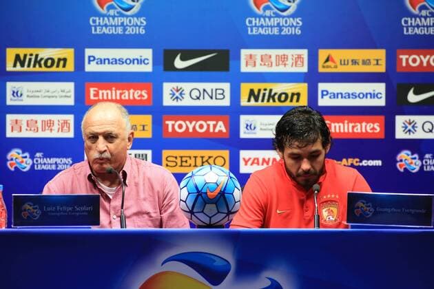 GUANGZHOU, CHINA - MARCH 16: (CHINA OUT) Luiz Felipe Scolari (L), head coach of Guangzhou Evergrande and Ricardo Goulart of Guangzhou Evergrande attend a press conference PK Pressekonferenz after the AFC Champions League Group H match between Guangzhou Evergrande and Urawa Red Diamonds on March 16, 2016 in Guangzhou, China.  CFP481257677 