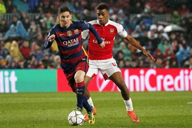 March 16, 2016 - Barcelona, Catalonia, Spain - BARCELONA -march 16- SPAIN: Leo Messi and Alex Iwobi during the match between FC Barcelona Barca and Arsenal FC, corresponding to the second legh of the 1 8 final of the Champions League, played at the Camp Nou Stadium, on march 16, 2016. Uefa Champions League Round of 16: Barcelona vs Arsenal  - ZUMAn230