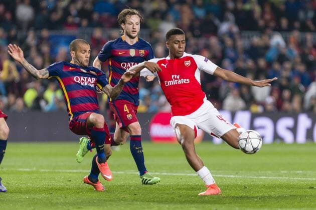 SPAIN - 16th Mar: Alex Iwobi, Ivan Rakitic and Dani Alves during the UEFA Champions League round of 16, second Leg match between FC Barcelona Barca - Arsenal FC, played at Camp Nou Stadium on 16th Mar 2016 in Barcelona, Spain. (Credit: Mikel Trigueros Urbanandsport Cordon Press)  xMikelxTriguerosx xSPAINx-xFCxBarcelonax-xArsenalxFCx-xChampionsxLeaguex-x2015 16x