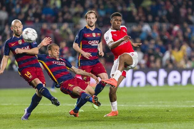 SPAIN - 16th Mar: Alex Iwobi (r) and Dani Alves during the UEFA Champions League round of 16, second Leg match between FC Barcelona Barca - Arsenal FC, played at Camp Nou Stadium on 16th Mar 2016 in Barcelona, Spain. (Credit: Mikel Trigueros Urbanandsport Cordon Press)  xMikelxTriguerosx xSPAINx-xFCxBarcelonax-xArsenalxFCx-xChampionsxLeaguex-x2015 16x