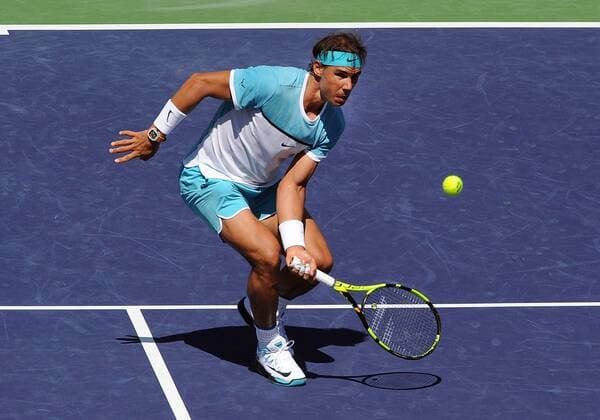 18 Mar. 2016: Rafael Nadal (ESP) returns a shot near the net during a quarterfinals match against Kei Nishikori (JPN) during the BNP Paribas Open played at the Indian Wells Tennis Garden in Indian Wells, CA. (Photo By John Cordes Icon Sportswire) TENNIS: MAR 18 BNP Paribas Open Icon506160318016 EDITORIAL USE ONLY