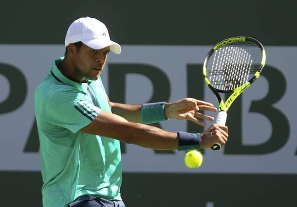 March 18, 2016 - Los Angeles, California, U.S - Jo-Wilfried Tsonga of of France in actions against Novak Djokovic of of Serbia during the men singles semifinal of the BNP Paribas Open tennis tournament on Friday, March 18, 2016 in Indian Wells, California. Tennis 2016 - BNP Paribas Open - Men Singles Semifinal - ZUMAc68_