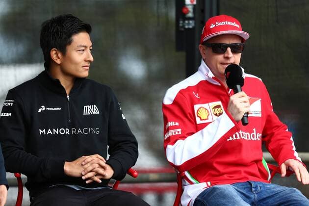 Australian Grand Prix, Melbourne 17 - 20 March 2016 19.03.2016 - Rio Haryanto (IND) Manor Racing MRT05 and Kimi Raikkonen (FIN) Scuderia Ferrari SF16-H 