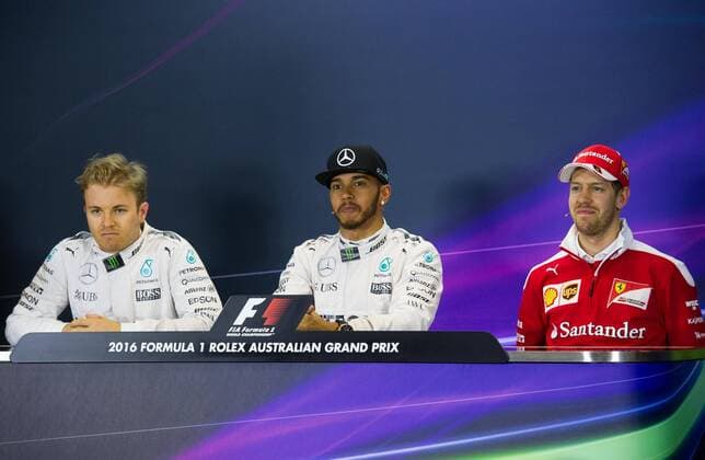(160319) -- MELBOURNE, March 19, 2016 -- Mercedes AMG Petronas s Formula One driver Lewis Hamilton (C) of Britain and Nico Rosberg (L) of Germany, Scuderia Ferrari s Formula One driver Sebastian Vettel of Germany attend a press conference PK Pressekonferenz after the qualifying session of Australian Formula One Grand Prix at Albert Park in Melbourne, Australia, March 19, 2016. Lewis Hamilton won the pole position. The Australian Formula One Grand Prix will take place in Melbourne on March 20. ) (SP)AUSTRALIA-MELBOURNE-F1-QUALIFYING SESSION-PRESS CONFERENCE BaixXue 