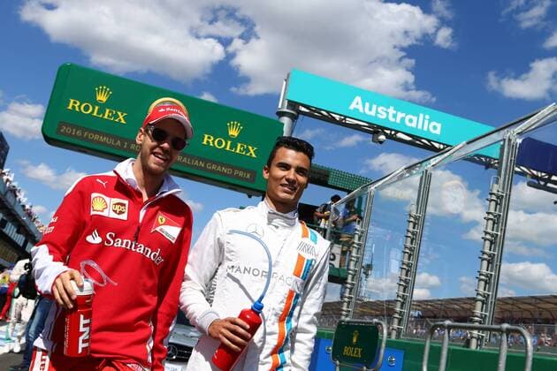 Australian Grand Prix, Melbourne 17 - 20 March 2016 20.03.2016 - Sebastian Vettel (GER) Scuderia Ferrari SF16-H and Pascal Wehrlein (GER) Manor Racing MRT05 