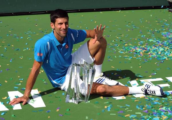 20 Mar. 2016: Novak Djokovic (SRB) with the winners trophy after Djokovic defeated Milos Raonic (CAN) 6-2, 6-0 to become the 2016 BNP Paribas Open Champion in a tournament played at the Indian Wells Tennis Garden in Indian Wells, CA. (Photo By John Cordes Icon Sportswire) TENNIS: MAR 20 BNP Paribas Open Icon506160320047 EDITORIAL USE ONLY