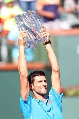 March 20, 2016: Novak Djokovic of Serbia celebrates with the winner s trophy after defeating Milos Raonic of Canada during the mens final of the 2016 BNP Paribas Open at Indian Wells Tennis Garden in Indian Wells, California. TENNIS 2016: BNP Paribas Open MAR 20 - ZUMAcb8_