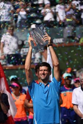 March 20, 2016 - Indian Wells, California, U.S. - NOVAK DJOKOVIC hoists the championship trophy after he beat M. Raonic in the ATP Tennis Herren Singles Final during the 2016 BNP Parisbas Open at Indian Wells Tennis Garden. Tennis 2016 - BNP Paribas Open - Men s Singles Final - ZUMAcg3_
