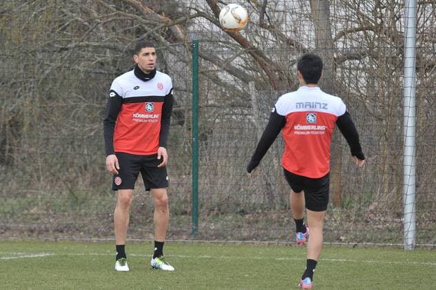 22.03.2016, xTKx, Fussball 1.Bundesliga, FSV MAINZ 05 Training, emspor, v.l. Leon Balogun (Mainz 05) , Yoshinori Muto (Mainz 05) ,