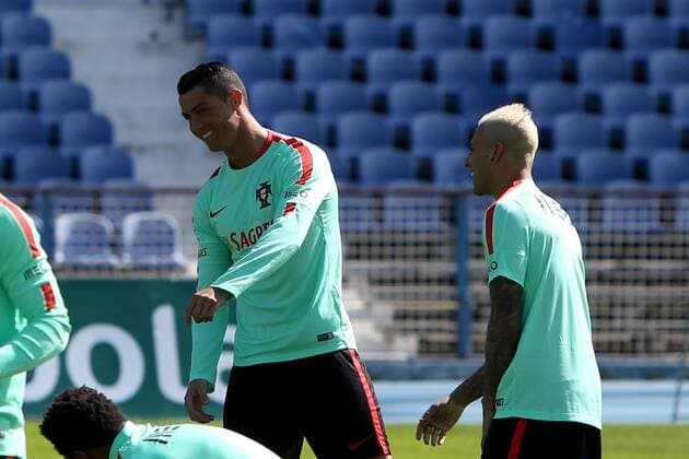 March 22, 2016 - Lisbon, Portugal - Portugal s soccer forward Cristiano Ronaldo (L ) rehearses the goal celebration choreography for Ricardo Quaresma (R ) during a practice session at the Restelo stadium in Lisbon, Portugal on March 22, 2016, ahead of the friendly matches against Bulgaria on March 25 and with Belgium on March 29 in preparation for the Euro 2016 in France. Portugal s soccer forward Cristiano Ronaldo rehearses the goal celebration choreography during practice  - ZUMAn230