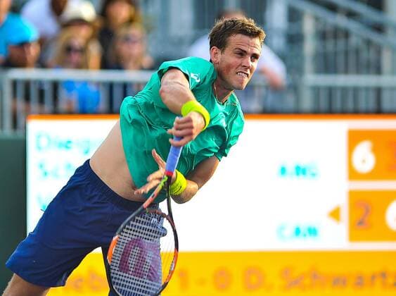 Canadian tennis player Vasek Pospisil returns the ball to Argentinian Diego Schwartzman during a Miami Tennis Open match held at Cayo Vizcaino, Miami, FL, United States, 23 March 2016. DIEGO SCHWARTZMAN VS. VASEK POPSIL !ACHTUNG: NUR REDAKTIONELLE NUTZUNG!  MIA017 20160324-635943794849957500