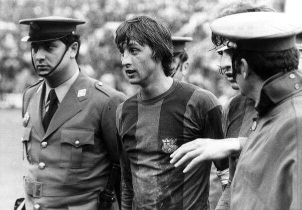An archive picture dated 11 Ferbruary 1975 that shows FC Barcelona Barca Dutch captain Johan Cruyff as he is forced to abandon the field by the Armed Police after being expelled by the referee during a Liga Barcelona - Malaga match in which the rival won 3-2, in Malaga, Andalusia, Spain. Cruyff died at 68 in Barcelona, 24 March 2016, after months of fighting a loan cancer. DUTCH SOCCER COACH JOHAN CRUYFF DIES AT 68 IN BARCELONA !ACHTUNG: NUR REDAKTIONELLE NUTZUNG!  CRU002 20160324-635944420376052649