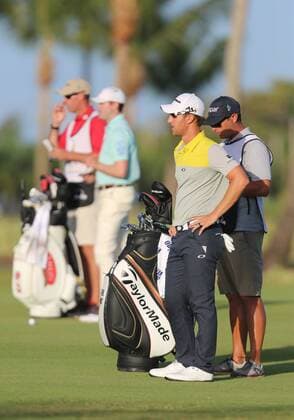 25 March 2016: Derek Ernst, Kyle Reifers and their caddies look down the fairway on hole 1 in the second Round of the Puerto Rico Open, in Rio Grande, PR (Photo by Bradley Rex Icon Sportswire) GOLF: MAR 25 PGA Golf Herren - Puerto Rico Open - Second Round Icon16032420 EDITORIAL USE ONLY
