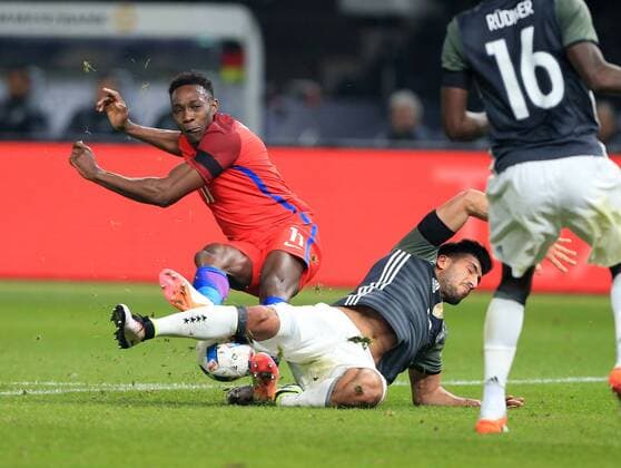 Germany s Emre Can tussles with England s Danny Welbeck during the International Friendly Länderspiel match at Olympiastadion. Photo credit should read: David Klein Sportimage EDITORIAL USE ONLY. No use with unauthorised audio, video, data, fixture lists, club league logos or live services. Online in-match use limited to 120 images, no video emulation. No use in betting, games or single club league player publications.