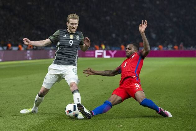 26.03.2016. Olympiastadion Berlin, Berlin, Germany. International Football Friendly Germany versus England. England& x2019;s Danny Rose with a challenge on Germany& x2019;s Andre Schurrle xCraigxMercerx  ActionPlus11722436