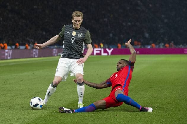 26.03.2016. Olympiastadion Berlin, Berlin, Germany. International Football Friendly Germany versus England. England& x2019;s Danny Rose with a challenge on Germany& x2019;s Andre Schurrle xCraigxMercerx  ActionPlus11722437