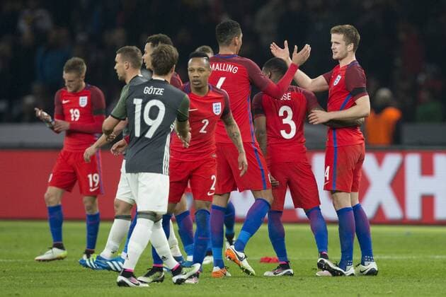 26.03.2016. Olympiastadion Berlin, Berlin, Germany. International Football Friendly Germany versus England. England& x2019;s Eric Dier gets thanks Rose and Smalling at full time after scoring the winning goal xCraigxMercerx  ActionPlus11722444