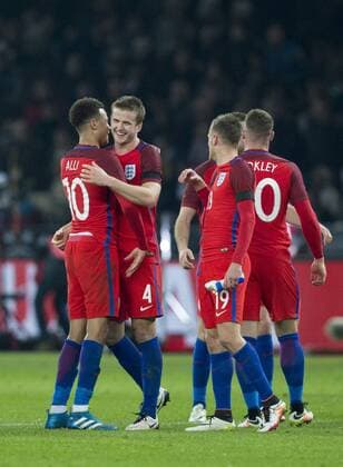 26.03.2016. Olympiastadion Berlin, Berlin, Germany. International Football Friendly Germany versus England. England& x2019;s Eric Dier gets thanks From Dele Alli and his team mates at full time after scoring the winning goal xCraigxMercerx  ActionPlus11722445