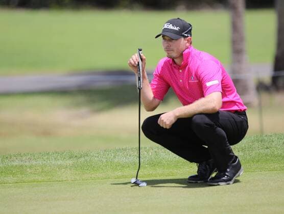 26 March 2016: Bronson Burgoon checks the green on the first hole of the third round of the Puerto Rico Open, in Rio Grande, PR (Photo by Bradley Rex Icon Sportswire) GOLF: MAR 26 PGA Golf Herren - Puerto Rico Open - Third Round Icon1603246 EDITORIAL USE ONLY